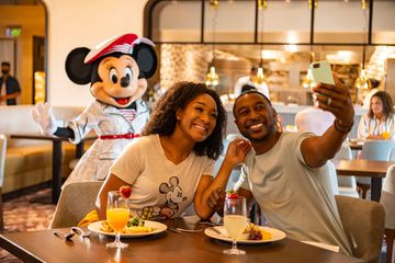 Couple Dining at Topolino's Terrace Riviera Resort