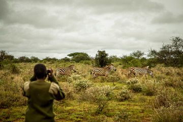 Community ranger Ruth Sikeita (27), from Olaisiti conducts a daily widlife patrol at the Olgulului Ololarashi Group Ranch in Kenya