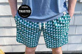 A person wearing the Fair Harbor The Anchor Swim Trunks