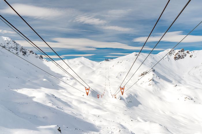 ski lift in arosa switzerland blue sky winter