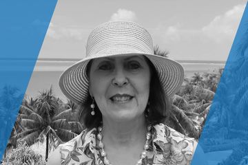 Black and white portrait of a person who is listed as an A List Travel Advisor 
